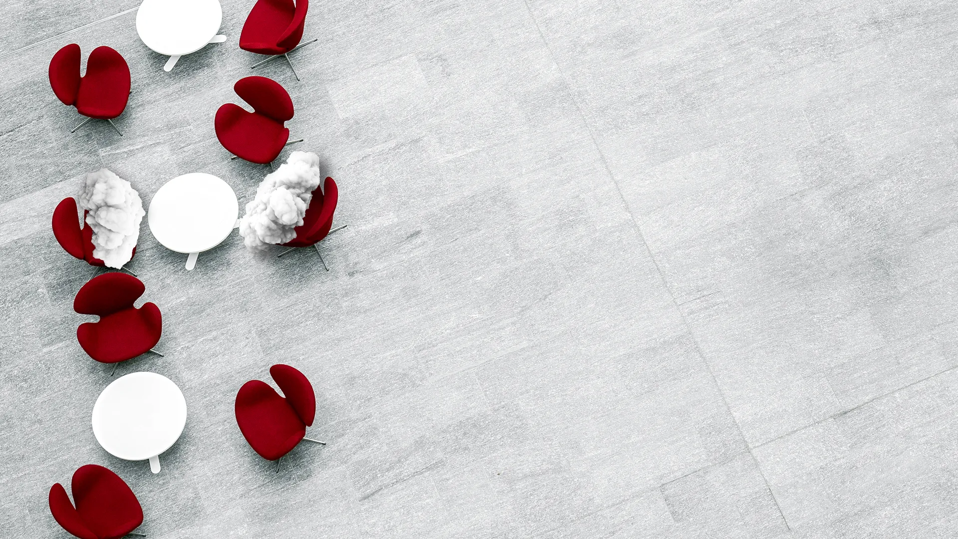 Overhead view of red chairs and white round tables on a gray tiled floor, with smoke or cloud effects near two chairs.